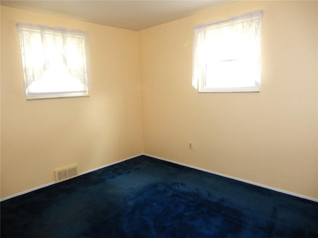 204 Stonebrook Dr, Peters Twp, PA 15317 - empty room featuring dark colored carpet and baseboards