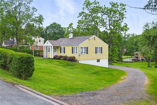 2600 Locust Ln, Hampton, PA 15101 - view of front of house with a front lawn, driveway, and a chimney