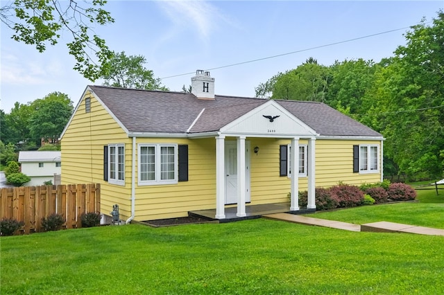 2600 Locust Ln, Hampton, PA 15101 - bungalow featuring a chimney, roof with shingles, and a porch