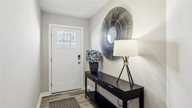699 Olivia St, Collier Twp, PA 15205 - entrance foyer featuring light wood finished floors and baseboards