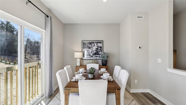 699 Olivia St, Collier Twp, PA 15205 - dining room featuring light wood-style floors and baseboards