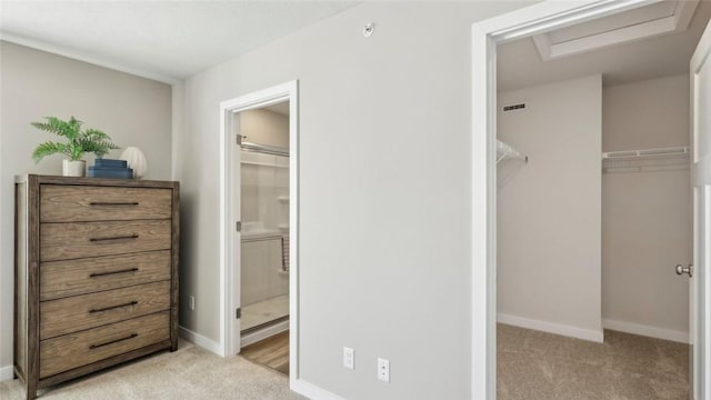 699 Olivia St, Collier Twp, PA 15205 - bedroom featuring light carpet, baseboards, attic access, and a closet