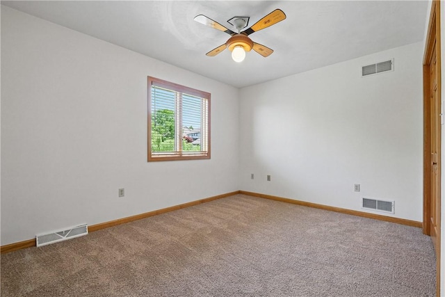 807 Rembrandt Cir, Hempfield Twp Wml, PA 15642 - spare room featuring baseboards, carpet floors, and a ceiling fan