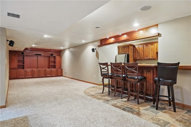 807 Rembrandt Cir, Hempfield Twp Wml, PA 15642 - indoor wet bar with freestanding refrigerator, baseboards, recessed lighting, and light carpet