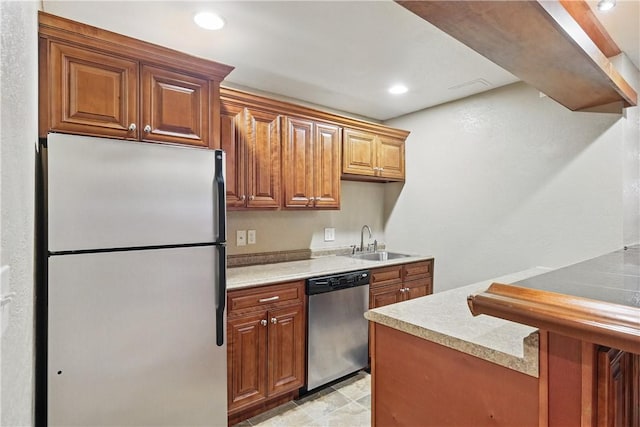 807 Rembrandt Cir, Hempfield Twp Wml, PA 15642 - kitchen with stainless steel appliances, a sink, light countertops, recessed lighting, and brown cabinets