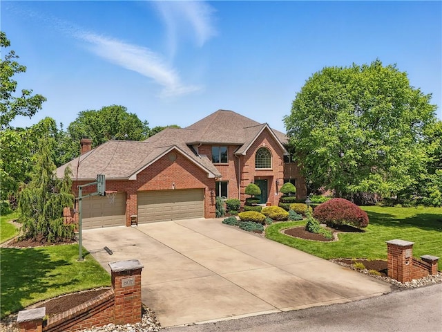 807 Rembrandt Cir, Hempfield Twp Wml, PA 15642 - view of front of house featuring brick siding, a garage, driveway, a front yard, and a chimney