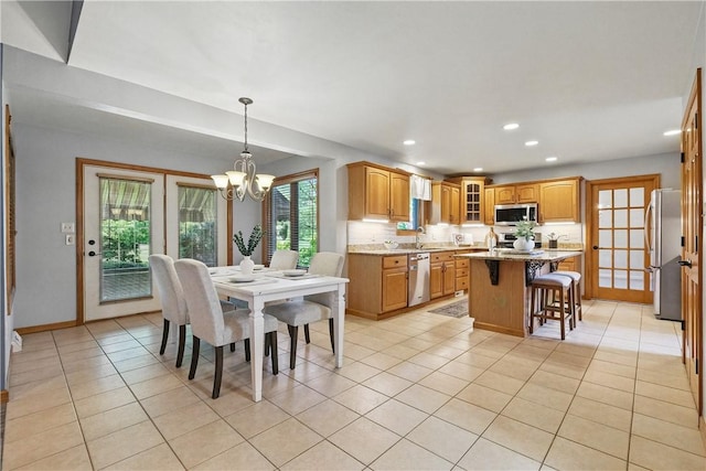 807 Rembrandt Cir, Hempfield Twp Wml, PA 15642 - dining space with a chandelier, light tile patterned floors, recessed lighting, and baseboards