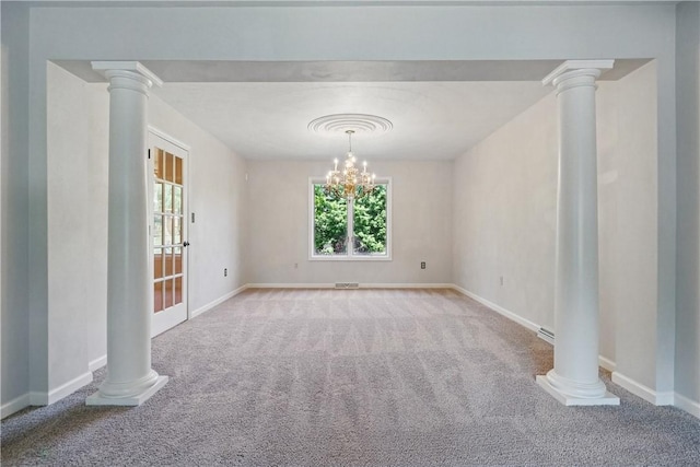 807 Rembrandt Cir, Hempfield Twp Wml, PA 15642 - carpeted empty room with ornate columns, baseboards, and a chandelier
