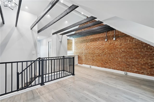 346 45th St, Lawrenceville, PA 15201 - bonus room with brick wall, wood finished floors, baseboards, and recessed lighting