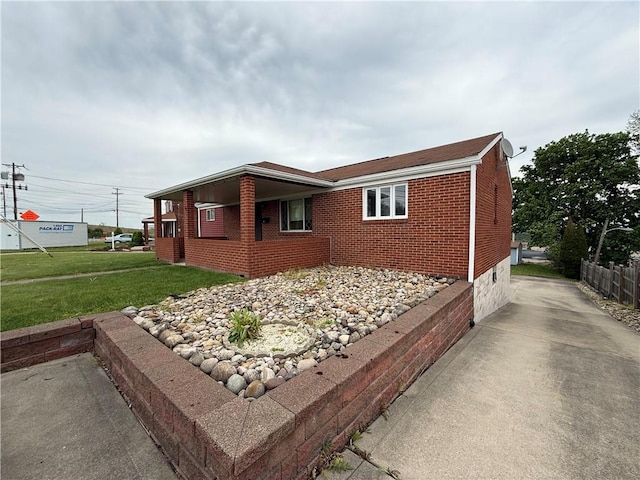201 Lebanon Manor Dr, West Mifflin, PA 15122 - view of home's exterior featuring brick siding and driveway