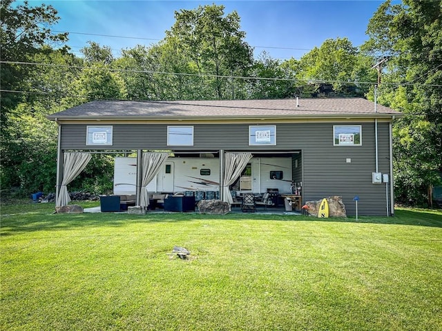126 Dockside Ln, Bradys Bend Twp, PA 16028 - rear view of house with a lawn