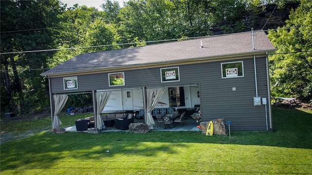 126 Dockside Ln, Bradys Bend Twp, PA 16028 - rear view of house featuring an outdoor living space, a patio, and a lawn