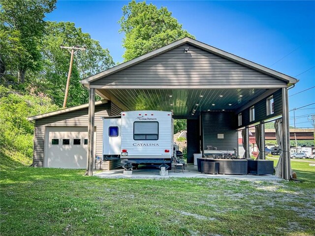126 Dockside Ln, Bradys Bend Twp, PA 16028 - view of front of house with a front yard and a detached garage