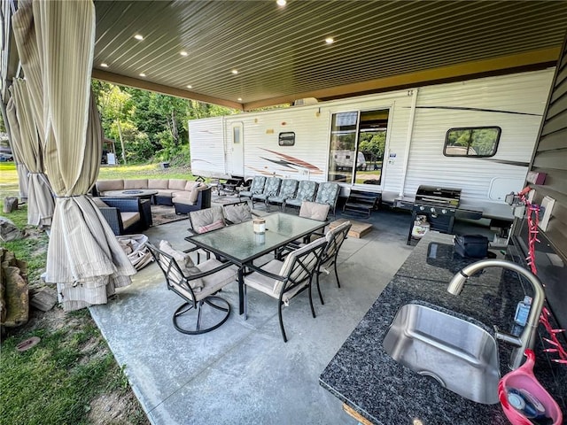 126 Dockside Ln, Bradys Bend Twp, PA 16028 - view of patio / terrace with outdoor lounge area, a sink, grilling area, entry steps, and outdoor dining space