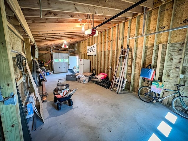 126 Dockside Ln, Bradys Bend Twp, PA 16028 - below grade area featuring a garage and freestanding refrigerator