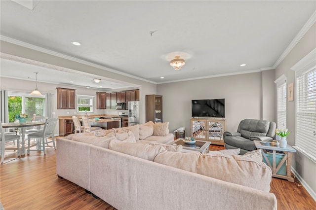 210 Brae Glen Dr, North Strabane, PA 15317 - living area featuring wood finished floors, recessed lighting, crown molding, and baseboards
