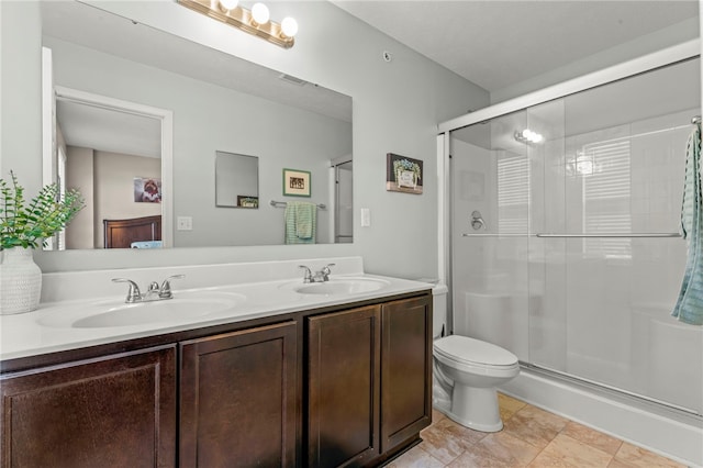 210 Brae Glen Dr, North Strabane, PA 15317 - full bathroom with double vanity, a stall shower, and toilet
