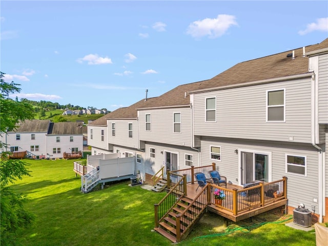 210 Brae Glen Dr, North Strabane, PA 15317 - rear view of property with central AC, a deck, and a lawn