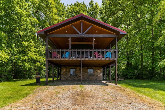 7832 Chase Dr, Shenango-Cra, PA 16134 - rustic home featuring driveway, stone siding, a carport, a deck, and a front yard