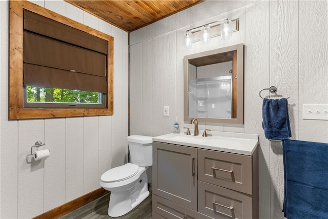 7832 Chase Dr, Shenango-Cra, PA 16134 - bathroom featuring toilet, vanity, wood finished floors, wood ceiling, and wooden walls