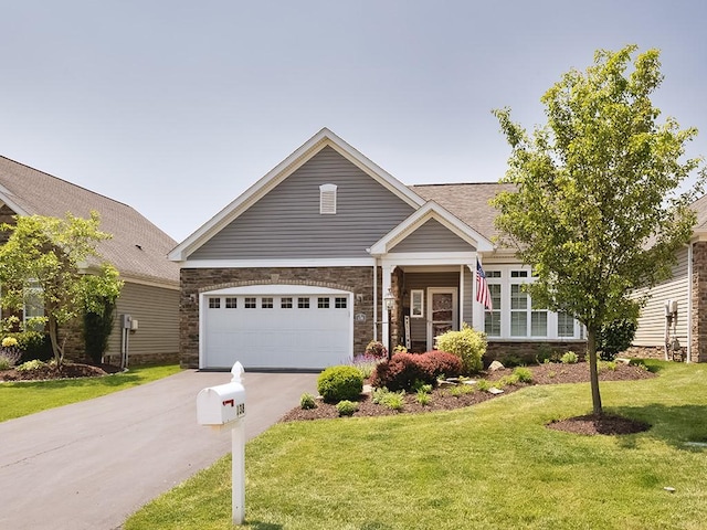 138 Cobblestone, Ohio Twp, PA 15237 - view of front of home featuring stone siding, driveway, a front lawn, and a garage