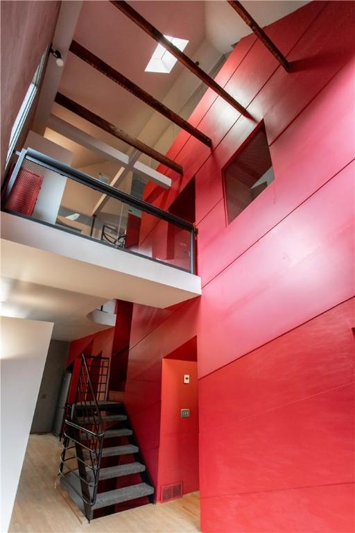 6542 Dalzell Pl, Squirrel Hill, PA 15217 - staircase featuring a high ceiling