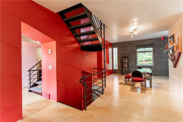 6542 Dalzell Pl, Squirrel Hill, PA 15217 - corridor featuring wood finished floors and stairs