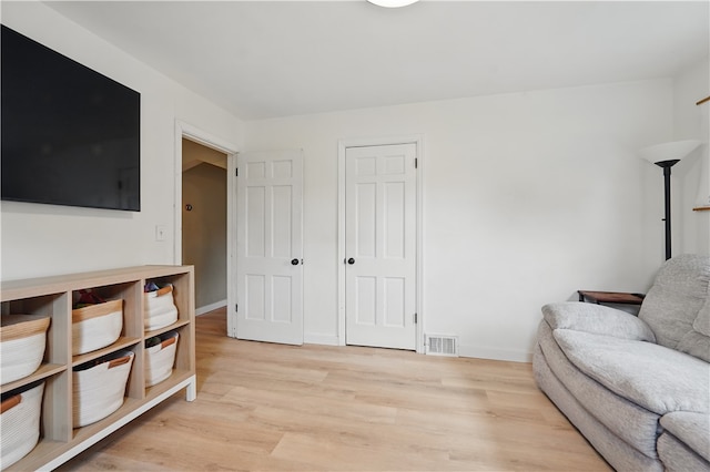 2023 Conlin St, West Mifflin, PA 15122 - living room featuring light wood finished floors and baseboards