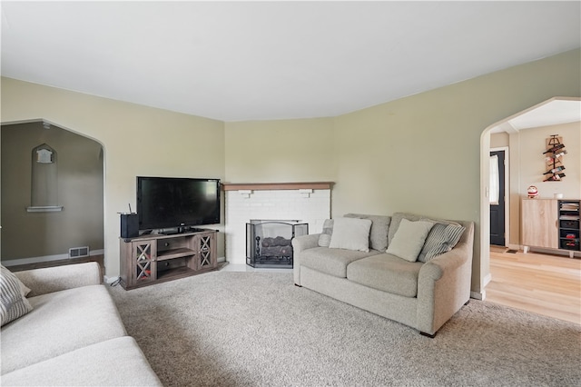 2023 Conlin St, West Mifflin, PA 15122 - carpeted living area featuring arched walkways