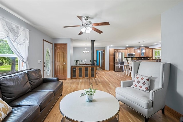 310 Laurel Ln, Leeper, PA 16233 - living area with ceiling fan, light wood-style flooring, recessed lighting, and a chandelier