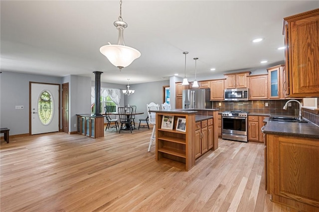 310 Laurel Ln, Leeper, PA 16233 - kitchen featuring appliances with stainless steel finishes, open shelves, a sink, dark countertops, and backsplash