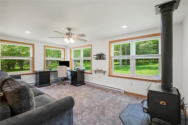 310 Laurel Ln, Leeper, PA 16233 - carpeted office with a baseboard heating unit, plenty of natural light, a ceiling fan, a wood stove, and recessed lighting