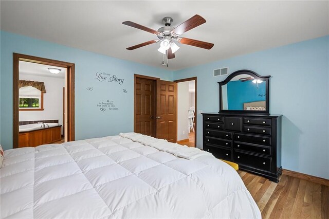 310 Laurel Ln, Leeper, PA 16233 - bedroom featuring light wood-style flooring, ensuite bath, a ceiling fan, and baseboards
