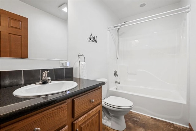 310 Laurel Ln, Leeper, PA 16233 - bathroom with vanity, tub / shower combination, toilet, and stone finish floors
