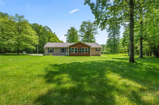 310 Laurel Ln, Leeper, PA 16233 - rear view of house featuring a lawn
