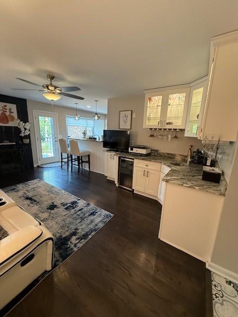 204 Thornberry Cir, Mt Lebanon, PA 15234 - kitchen featuring beverage cooler, a sink, white cabinetry, ceiling fan, and dark wood-style floors