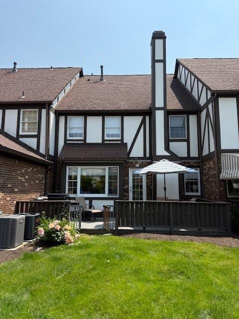 204 Thornberry Cir, Mt Lebanon, PA 15234 - back of house with a yard, central AC unit, roof with shingles, brick siding, and stucco siding