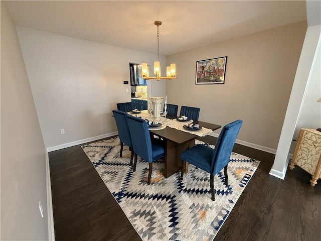 204 Thornberry Cir, Mt Lebanon, PA 15234 - dining room featuring a chandelier, baseboards, and wood finished floors