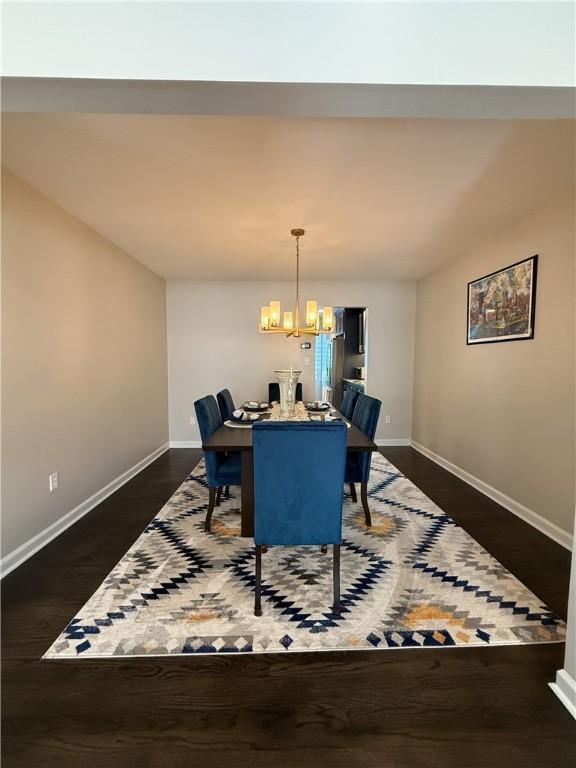 204 Thornberry Cir, Mt Lebanon, PA 15234 - dining room with a chandelier, baseboards, and dark wood finished floors