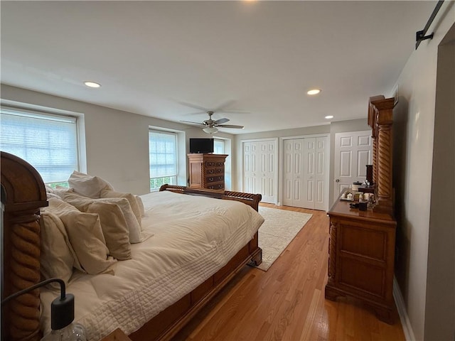 204 Thornberry Cir, Mt Lebanon, PA 15234 - bedroom with two closets, wood finished floors, recessed lighting, ceiling fan, and a barn door