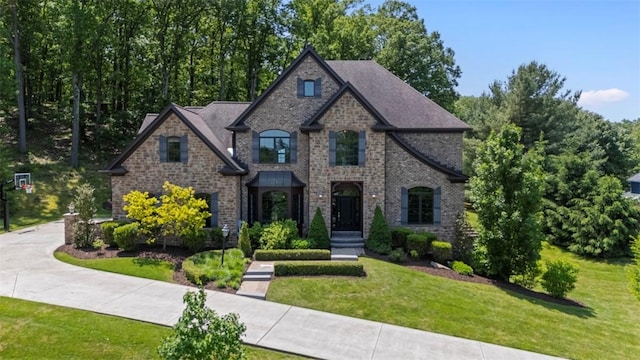 301 Chinquapin Ln, Marshall, PA 15090 - french country home with a front lawn and brick siding