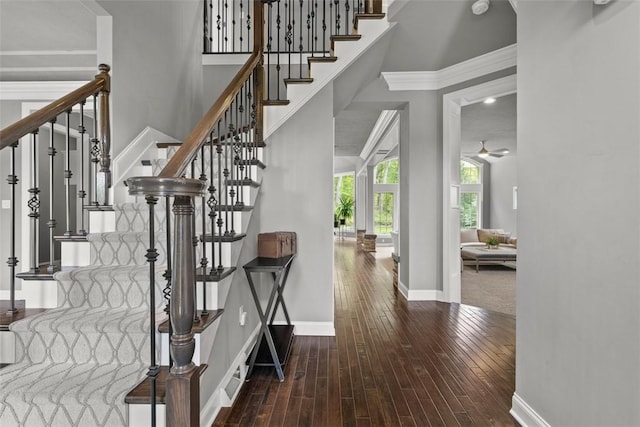 301 Chinquapin Ln, Marshall, PA 15090 - staircase featuring hardwood / wood-style flooring, baseboards, a ceiling fan, a high ceiling, and ornamental molding