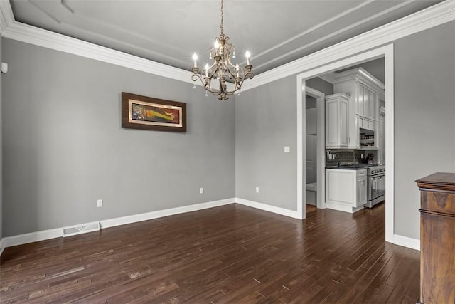 301 Chinquapin Ln, Marshall, PA 15090 - unfurnished room with a chandelier, dark wood-type flooring, baseboards, ornamental molding, and a raised ceiling