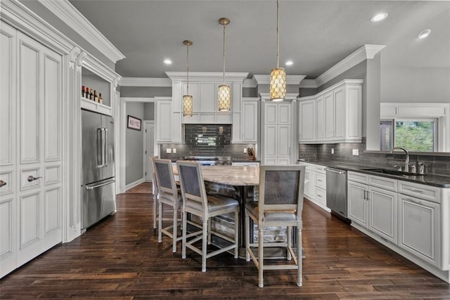 301 Chinquapin Ln, Marshall, PA 15090 - kitchen featuring stainless steel appliances, a sink, ornamental molding, recessed lighting, and a kitchen island