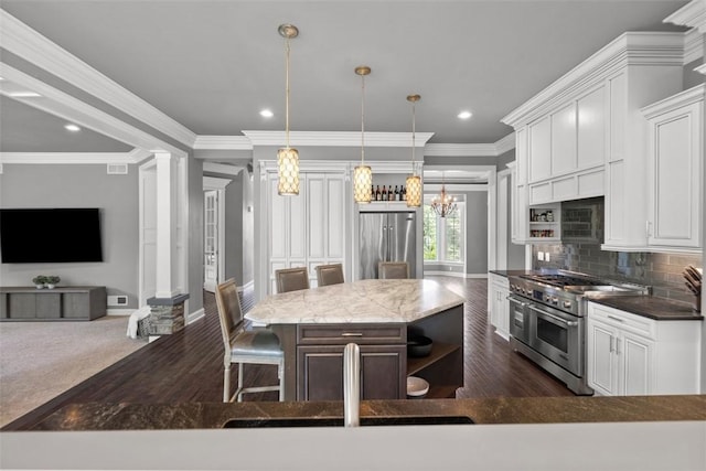 301 Chinquapin Ln, Marshall, PA 15090 - kitchen featuring stainless steel appliances, white cabinetry, a chandelier, a center island, and crown molding