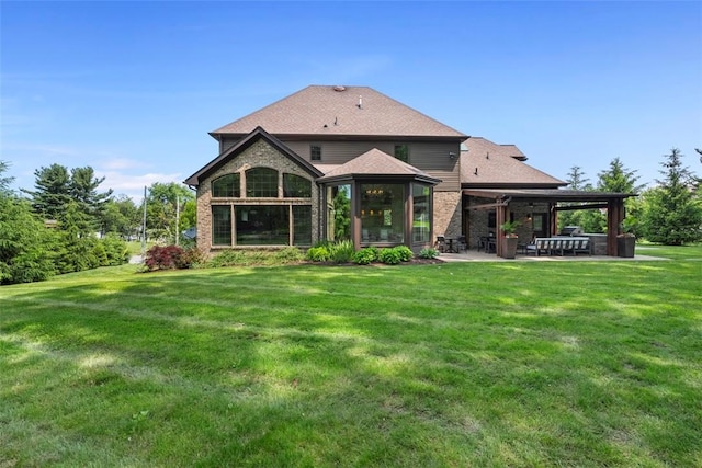 301 Chinquapin Ln, Marshall, PA 15090 - rear view of property featuring a patio, a lawn, brick siding, a hot tub, and a shingled roof