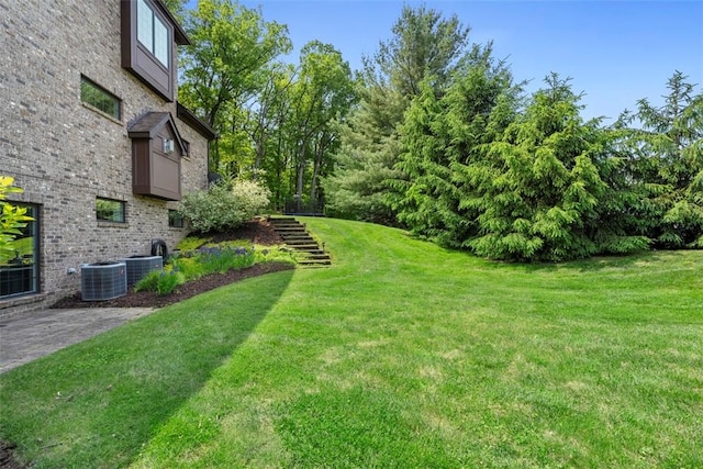 301 Chinquapin Ln, Marshall, PA 15090 - view of green lawn with central AC unit and stairway
