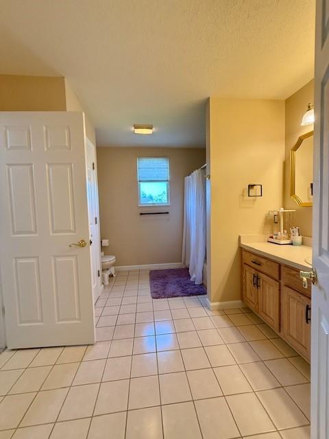 116 Valleycrest Dr, Cecil, PA 15321 - bathroom featuring toilet, vanity, baseboards, tile patterned floors, and curtained shower