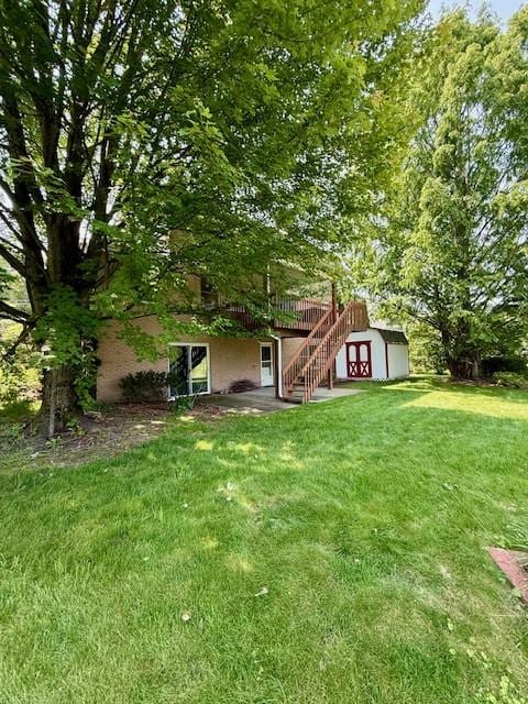 116 Valleycrest Dr, Cecil, PA 15321 - view of grassy yard featuring stairs and a deck