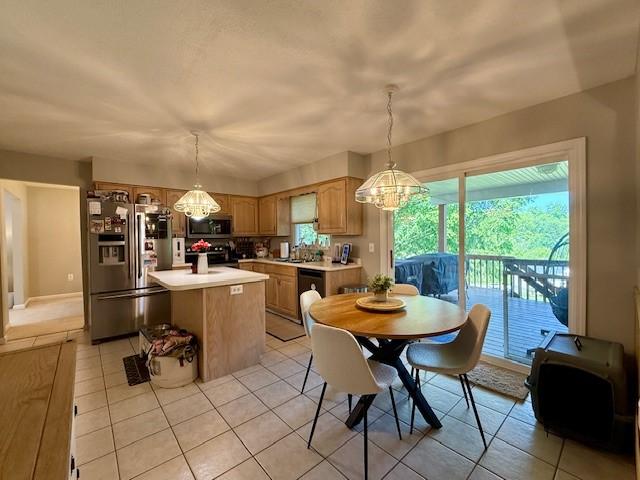 116 Valleycrest Dr, Cecil, PA 15321 - dining space with light tile patterned flooring and a chandelier